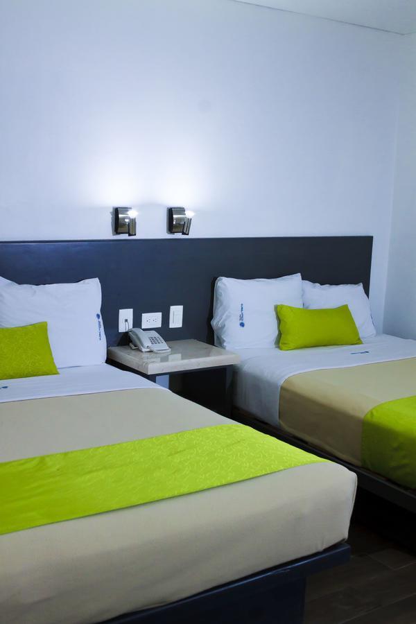 Global Express Hotel เอสการ์เซกา ภายนอก รูปภาพ